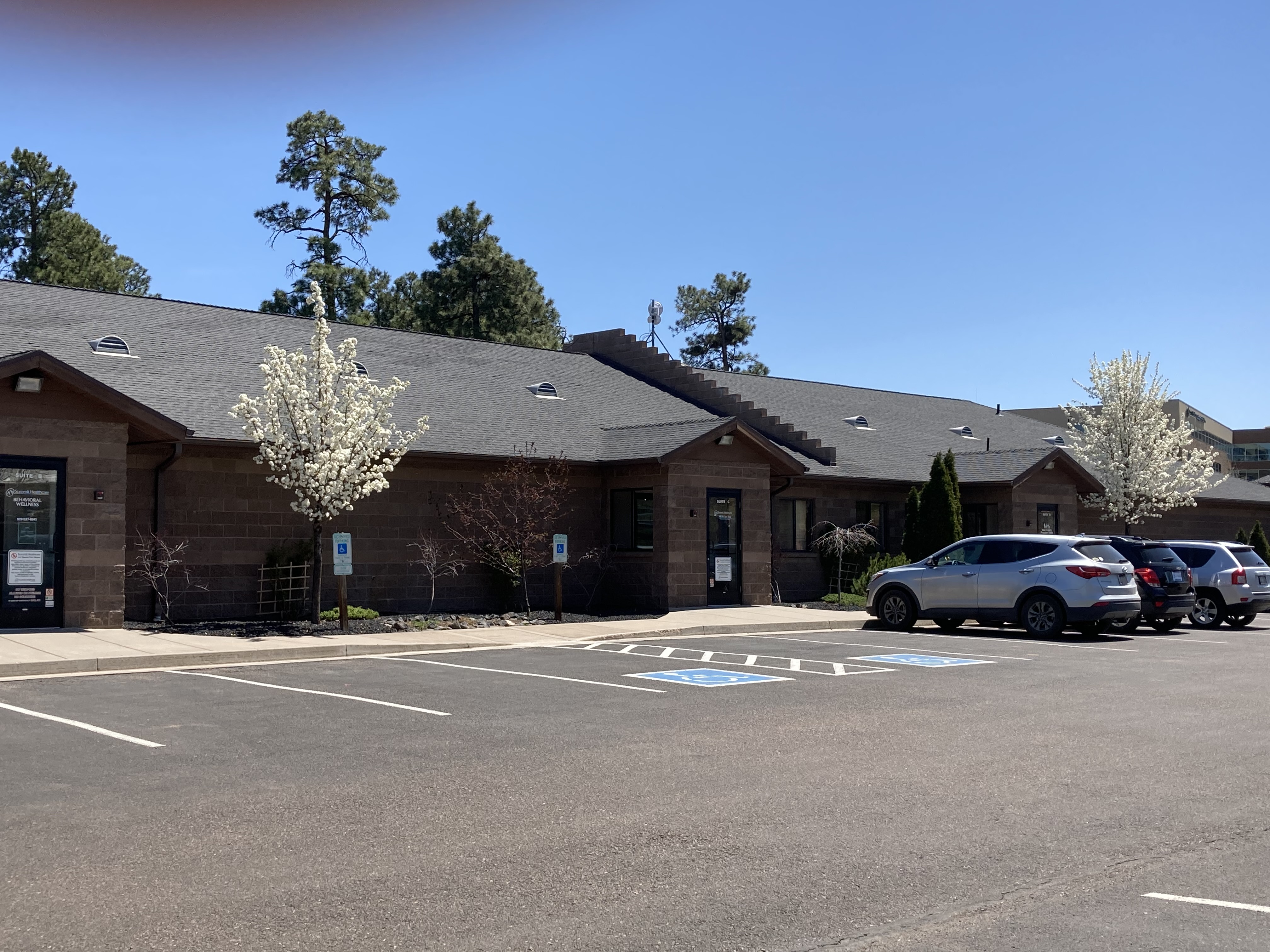 view of outside of office from parking lot